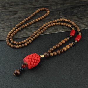 Collier en bois perles de mala